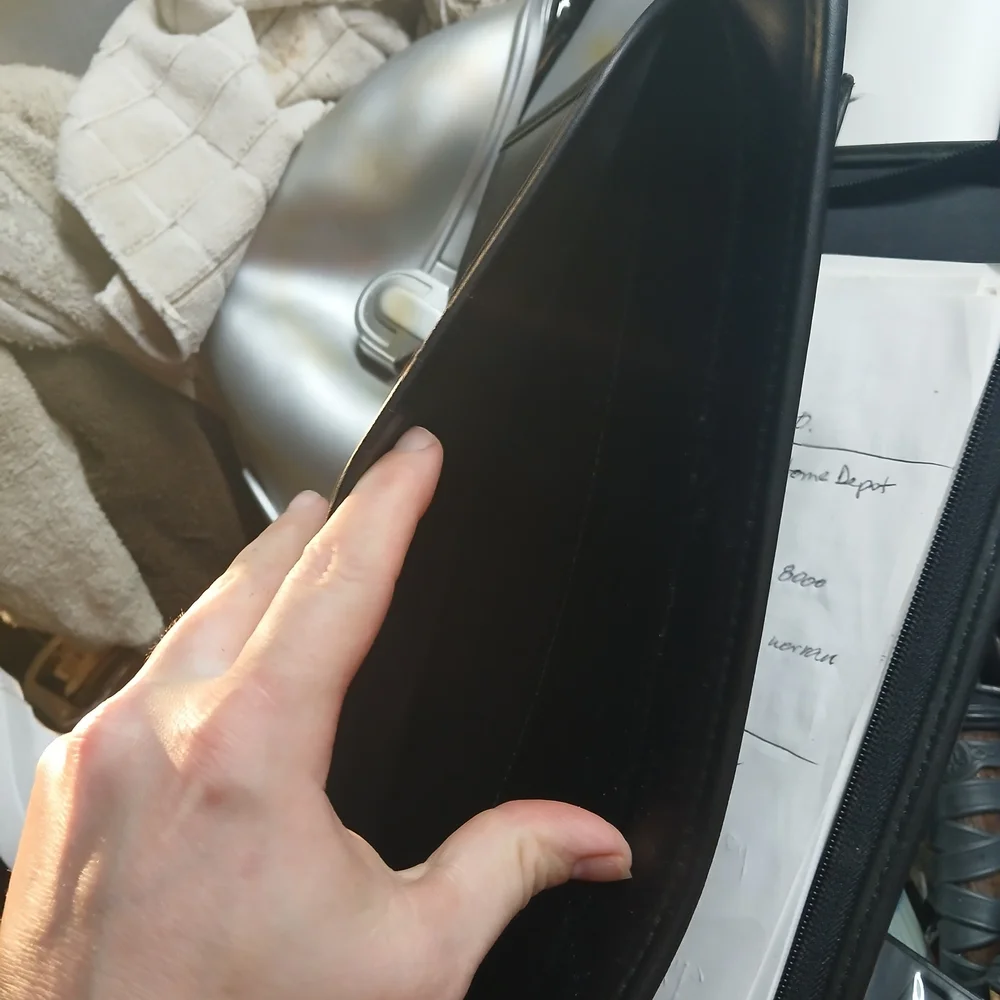 Hilton Worldwide Black Leather Business Portfolio